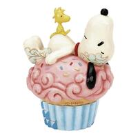 Peanuts by Jim Shore - Snoopy Laying on Cupcake