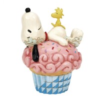 Peanuts by Jim Shore - Snoopy Laying on Cupcake